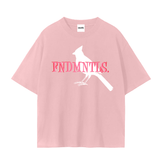 Front view of pink FNDMNTLS. Pink Panther Unisex Seamless T-Shirt with white bird silhouette and bold pink branding on 230 GSM fabric.
