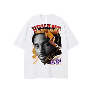 White unisex Kobe Bryant jersey t-shirt featuring a bold graphic of Kobe in action and portrait, ideal for casual streetwear and fans.