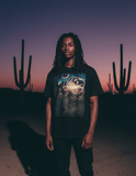 Ezekiel 1:4-28 Cotton T-Shirt - Unisex features a vivid biblical illustration on soft black cotton, styled in a loose fit for casual comfort.