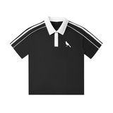 Black short-sleeve polo shirt with contrast white collar and shoulder stripes, unisex cotton blend with bird logo on chest.