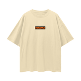 Beige FNDMNTLS. Shattered Tee with front orange logo, oversized deep drop shoulder t-shirt for unisex streetwear fashion.