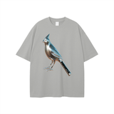 Gray T-shirt with metallic bird design from Chrome Cardinals FNDMNTLS collection