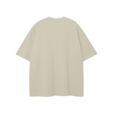 Beige short-sleeved tee from Chrome Cardinals FNDMNTLS collection displaying a metallic bird design