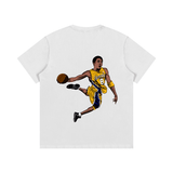 Back of white Kobe Cartoon Cotton T-Shirt showing cartoon Kobe Bryant dunking in Lakers uniform. Ideal unisex cotton casual tee.