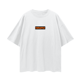 White FNDMNTLS. Shattered Tee with bold orange chest logo, oversized unisex t-shirt with deep drop shoulders for casual wear.