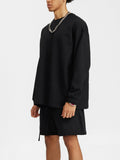 Black long sleeve shirt and shorts outfit featuring the God Fndmntls Long Sleeve Crest Shirt