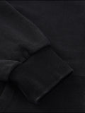 Black sweatshirt sleeve with ribbed cuff from FNDMNTLS Snow Washed Crest Cardigan