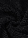 Black textured fabric from FNDMNTLS Snow Washed Crest Cardigan in inches and centimeters