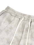 Gray tie-dye washed fleece sweatpants with a relaxed fit, ideal for casual wear