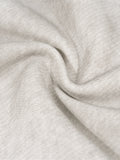 Wrinkled light gray dirty washed fleece fabric close-up for washed fleece sweatpants