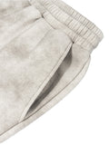 Washed fleece sweatpants with elastic waistband and side pocket in gray tie-dye pattern