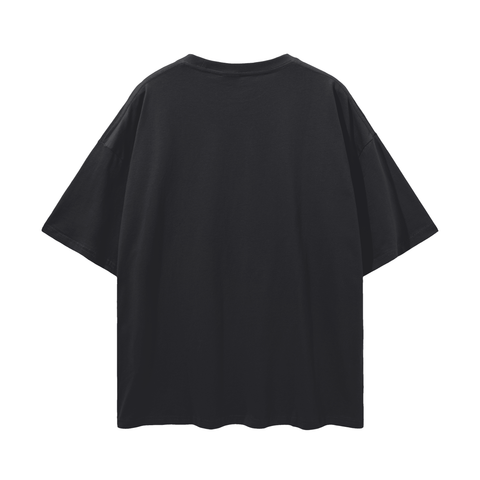 Black short-sleeved behold oversize skull graphic tee with slight stretch, 26 inch fit