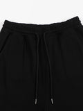 Ferrari Boys black cotton fleece sweatpants with drawstring and bird emblem detail