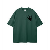 Dark green Jurassic Park footprint graphic t-shirt with loose fit and round neck, 100% cotton breathable fabric, unisex streetwear style.