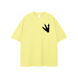 Yellow loose fit graphic t-shirt with black Jurassic Park footprint print on chest, made of breathable 100% cotton.