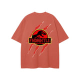 Unisex loose fit graphic t-shirt with FNDMNTLS Jurassic Park footprint design on red cotton fabric