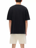 Oversize Deep Drop Black T-Shirt with Drop Shoulder and Beige Shorts for Casual Style