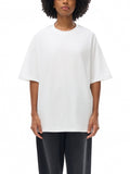 Woman wearing Oversize Deep Drop Black Tee with drop shoulder design and oversized fit
