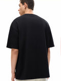 Black oversized T-shirt with deep drop shoulder design for a relaxed fit