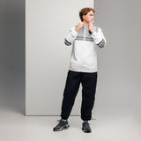 Man in white and black athletic wear with breathable mesh lining for Ferrari Boys water-resistant fabric