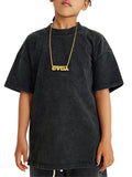 Child wearing a washed kids graphic Dino Tee with black t-shirt and gold necklace
