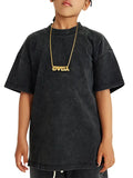 Child wearing a washed kids graphic Dino Tee with black t-shirt and gold necklace