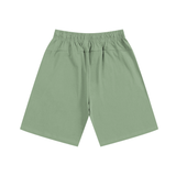 Green elastic waist shorts made of heavyweight cotton fabric, available in various inches and centimeters