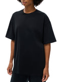 Black oversized T-shirt featuring Angel Wings Fndmntls Green Graphic Tee design