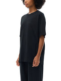 Black oversized T-shirt featuring Angel Wings Fndmntls Green Graphic Tee design in inches