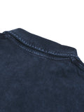 Blue denim shirt collar detail on heavyweight snow-washed polo with bird emblem