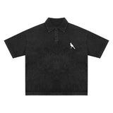 Black heavyweight snow-washed polo t-shirt with bird emblem, stylish inch and cm design