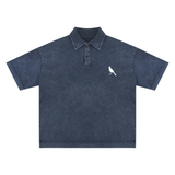 Blue heavyweight snow-washed polo shirt with bird emblem, ideal snow-washed polo t-shirt