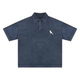 Blue heavyweight snow-washed polo shirt with bird emblem, ideal snow-washed polo t-shirt