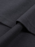 Dark gray fabric with stitched seams in a cut boxy graphic pattern for Skeleton Tee