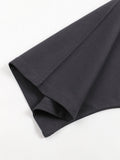Folded dark fabric of Skeleton Graphic Boxy Cut Tee featuring pattern cut boxy style