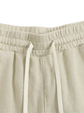 Close-up of beige Vintage Washed Cotton Sweatpants waistband with adjustable drawstring for a secure and comfortable fit.