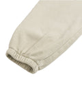 Elastic cuff detail of beige Vintage Washed Cotton Sweatpants designed for a secure ankle fit and relaxed silhouette.