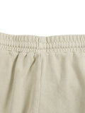 Rear waistband detail of beige Vintage Washed Cotton Sweatpants showing elastic construction for added comfort.