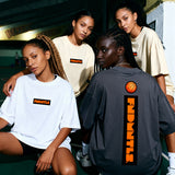 Four individuals wearing 'FIGHTER' branded t-shirts in an outdoor setting.