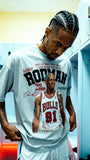Person wearing a t-shirt with a graphic of a basketball player and text