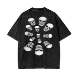 Black Nephilim Oversize Snow Wash graphic tee with multiple white skull prints, loose fit, 100% cotton, short sleeve streetwear shirt